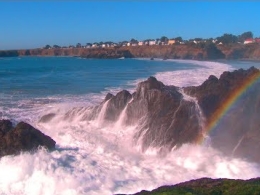 Ocean Waves Crashing with Sea Mist Rainbow